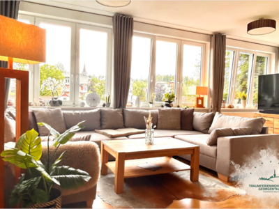 Traumferienwohnungen Georgenthal Wohnzimmer mit Logo